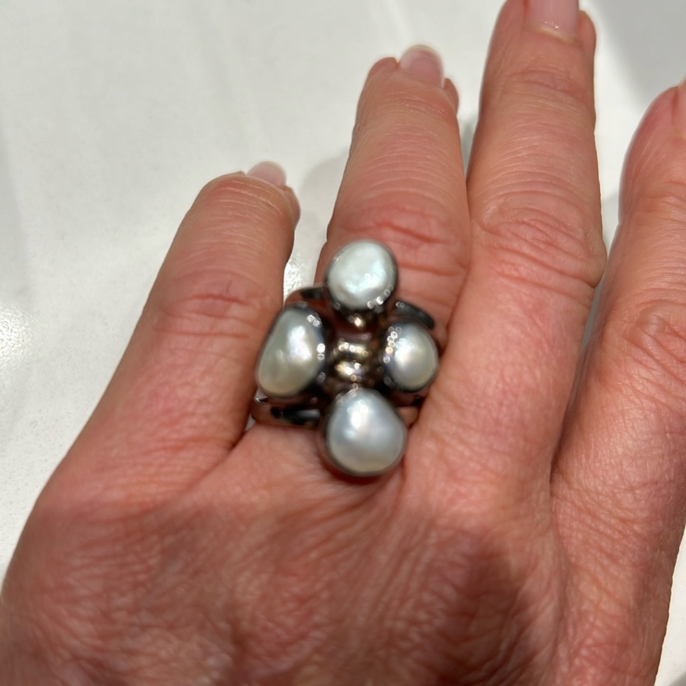 Genuine pearls, and sterling silver rings